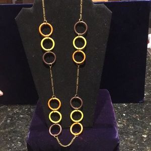 Long chain with yellow, orange and brown circles